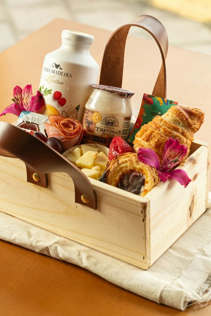 10 Premium Corporate Diwali Gifts for Employees, Clients and Boss (2026) Wooden gift basket with gourmet treats and flowers