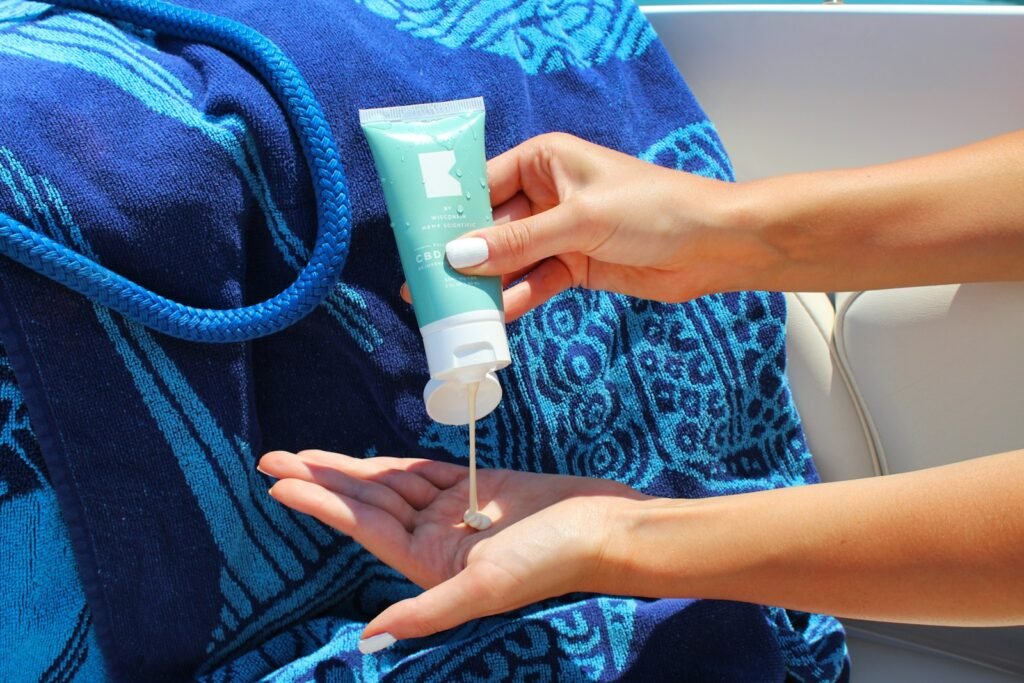 Dot & Key vs Minimalist Sunscreen: Which Is Better for Oily Skin? (2026) Sunscreen squeezed from a tube into an open palm
